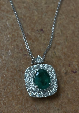 Diamond Pendant With Emerald Center. Diamonds on Chain.