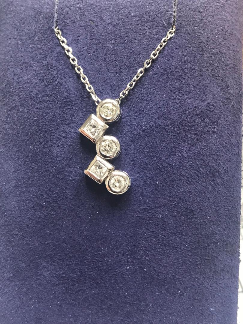 White Gold Diamond Shapes Pendant