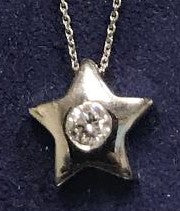 Diamond womens star pendant